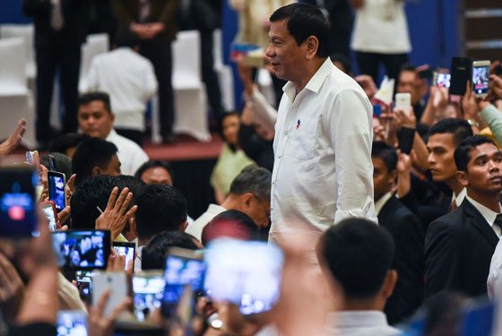 President Rodrigo Duterte arrives to meet Philippine nationals living in Malaysia during his official visit in Kuala Lumpur. AFP Photo