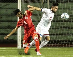 Ebrahim Ahmed Habib (left) Ahmed of Bahrain and Manuel Ott of Philippines fights for the ball during a friendly game between the Philippines and Bahrain at Rizal Memorial Stadium in Manila on October 7. Photo by Dj Diosina