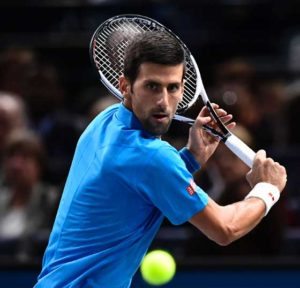 Serbia’s Novak Djokovic returns the ball to Luxembourg’s Gilles Muller during their second round tennis match at the ATP World Tour Masters 1000 indoor tournament in Paris on Thursday.  AFP PHOTO 