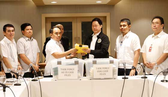 Assistant Secretary Kris Ablan of the Presidential Communications Office and Presidential Task Force on Media Security Executive Director Undersecretary Joel Sy Egco (second and third from left) formally turn over the inventory of cases involving media killings to Senior Deputy Executive Secretary Menardo Guevarra who represented President Rodrigo Duterte. Also in photo (from left) are Nelson Santos, Aries Estrella, Undersecretary Erickson Balmes and Chief Supt. Eric Serafin Reyes. CONTRIBUTED PHOTO