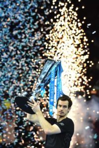 Britain’s Andy Murray celebrates with the trophy after winning the men’s singles final against Serbia’s Novak Djokovic on the eighth and final day of the ATP World Tour Finals tennis tournament in London on Monday.   AFP PHOTO