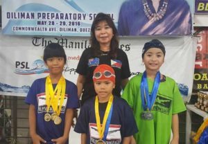 Promising tankers Tara Beard, Rafael Escalona and Ehm Alavy-Chafi with Philippine Swimming League (PSL) Secretary General Maria Susan Benasa during the awarding ceremony of the PSL National Series for Class C and Novice on Sunday at the  Diliman Preparatory School swimming pool.  CONTRIBUTED PHOTO