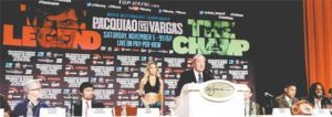 Trainer Freddie Roach (left), boxers Manny Pacquiao of the Philippines (second left) and Jessie Vargas of the USA (second right) and trainer Dewey Cooper (right) listen to pomoter Bob Arum, during a news conference at The Wynn Las Vegas, Thursday. Pacquiao will challenge Jessie Vargas of the US for the WBO Welterweight Championship on Sunday at the Thomas & Mack Center in Las Vegas.  AFP PHOTO 