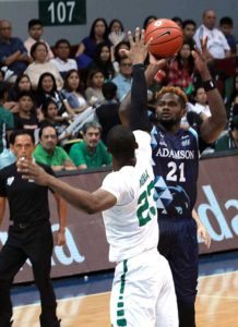 Adamson U’s Papi Sarr fires a shot past Ben Mbala of La Salle during a UAAP men’s basketball game at the Mall of Asia Arena in Pasay City.  PHOTO BY BOB DUNGO JR.