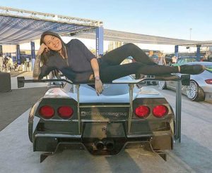 Black Manta owner Angie Mead King shows just how durable his car’s rear wing is.