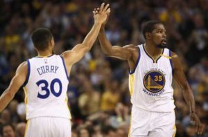 Stephen Curry (left) and Kevin Durant  AFP PHOTO 