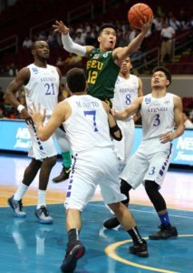 Monbert Arong of FEU drives on Michael Nieto and Adrian Wong of ADMU during a UAAP men’s basketball elimination round game at the Mall of Asia Arena. Photo by Russell Palma 