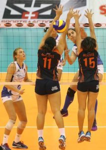 BaliPure’s Amy Ahomiro rams in a kill into Coast Guard’s defense made up of Grenlen Malapit (11) and Alarnie Pesebre (15) during their Shakey’s V-League Reinforced Conference duel at the Philsports Arena.  CONTRIBUTED PHOTO