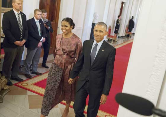 Us President barack Obama and First lady Michelle Obama arrive to present the Presidential Medal of Freedom, the nation’s highest civilian honor, during a ceremony in the East Room of the White house in Washington, DC, November 22.  AFP FILE PHOTO