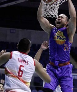 TNT’s Kelly Williams dunks the ball unopposed during their game against Phoenix Petroleum in the Philippine Basketball Association Season 42 Philippine Cup at the Araneta Coliseum on Friday. 