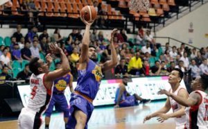 Ranidel De Ocampo of TNT shoots the ball past Vic Manuel of Alaska during the Philippine Basketball Association Season 42 Philippine Cup at the Philsports Arena in Pasig City on Friday.  CONTRIBUTED PHOTO