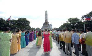 Rizalistas offer prayers and flowers to celebrate the 155th birthday of Dr. Jose Rizal in June at the Luneta Park in Manila.  Photo by Russell Palma