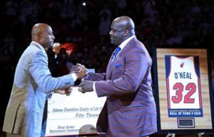 Former teammate Alonzo Mourning speaks during a ceremony to honor Shaquille O’Neal as he has his number retired during a game between the Miami Heat and the Los Angeles Lakers at American Airlines Arena on Friday in Miami, Florida.  AFP PHOTO