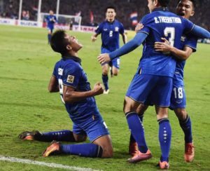 Thailand football player Sirod Chatthong (left) celebrates after scoring against Indonesia during the second leg of the AFF Suzuki Cup Final between Thailand and Indonesia at Rajamangala Stadium in Bangkok on Saturday. AFP PHOTO 