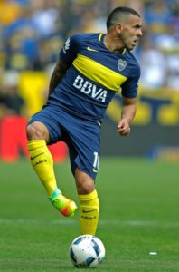 Boca Juniors’ forward Carlos Tevez controlling the ball during their Argentina First Division football match against Sarmiento at La Bombonera stadium in Buenos Aires.  AFP PHOTO 