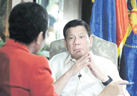 HOPEFUL President Rodrigo Duterte is photographed in one of his media interviews in Malacañang on Thursday. He called on Filipinos to welcome 2017 ‘with renewed determination and a reinvigorated spirit.’ MALACAÑANG PHOTO