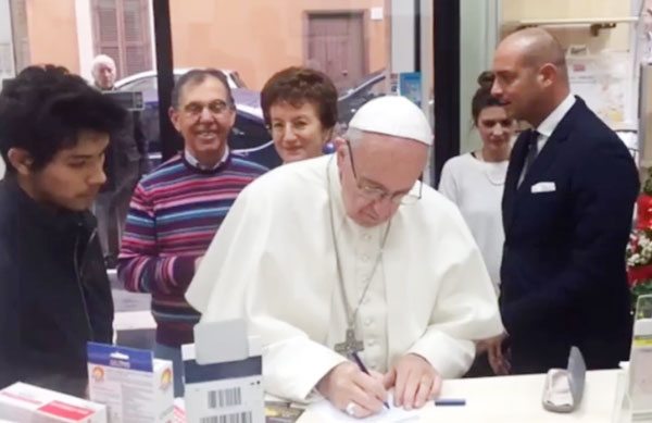 OUT SHOPPING Pope Francis is seen in this screen grab inside a store outside the Vatican. The pontiff bought orthopedic shoes.