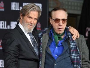 Jeff Bridges (left) hugs Peter Bogdanovich at Bridge’s Hand and Footprint Ceremony at the TCL Chinese Theater in Hollywood, California