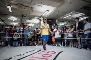 Philippine boxing icon Manny Pacquiao uses a skipping rope during a media call in Hong Kong on October 27, 2014. AFP PHOTO 