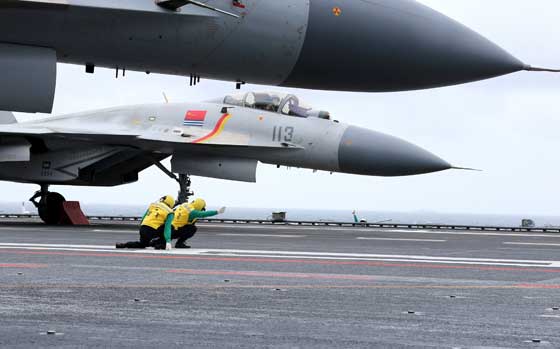 SEA DRILLS This photo taken on January 2, 2017 shows Chinese J-15 fighter jets on the deck of the Liaoning aircraft carrier during military drills in the South China Sea. The aircraft carrier is one of the latest steps in the years-long build-up of China’s military, as Beijing seeks greater global power to match its economic might and asserts itself more aggressively in its own backyard. AFP PHOTO