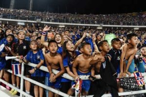 Local football fans celebrate after Thailand won the AFF Suzuki Cup finals against Indonesia, at Rajamangala Stadium in Bangkok, on December 17, 2016.  AFP Photo 