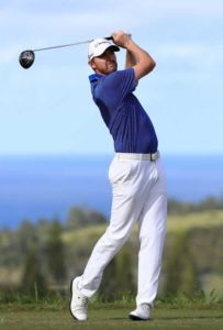 Jimmy Walker of the United States plays his shot from the 16th tee during the first round of the SBS Tournament of Champions at the Plantation Course at Kapalua Golf Club on Friday in Lahaina, Hawaii. AFP PHOTO 