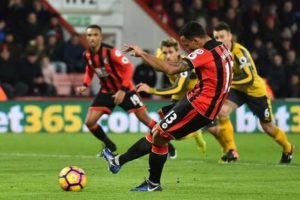 Bournemouth’s English striker Callum Wilson scores their second goal from the penalty spot during the English Premier League football match between Bournemouth and Arsenal at the Vitality Stadium  in Bournemouth, southern England on Wednesday.   AFP PHOTO