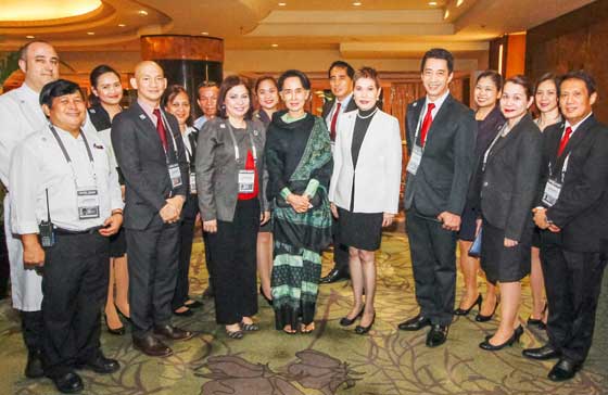 (Front row, from left) DHP Assistant Chief Engineer Mario Manalastas, Ramos, Robles, Myanmar State Counsellor Daw Aung San Suu Kyi, Ledesma Suatengco, Reynoso,  Director of Sales Ria Gatus-Galvez, and Philbert Togle together with hotel managers
