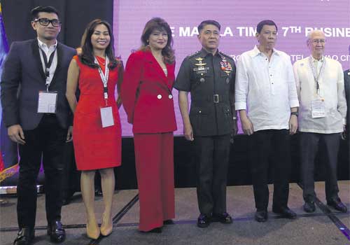 The Times’ Chairman Emeritus Dante Arevalo Ang (rightmost) with President Duterte and partners, from leftmost: Harold Geronimo, Megaworld Corporation Senior Assistant Vice President and Public Relations and Media Affairs head; Sheila Lobien, Jones Lang LaSalle regional director and one of the forum speakers; Ilocos Norte Gov. Imee Marcos; Gen. Rey Leonardo Guerrero, chief of the Armed Forces of the Philippines.