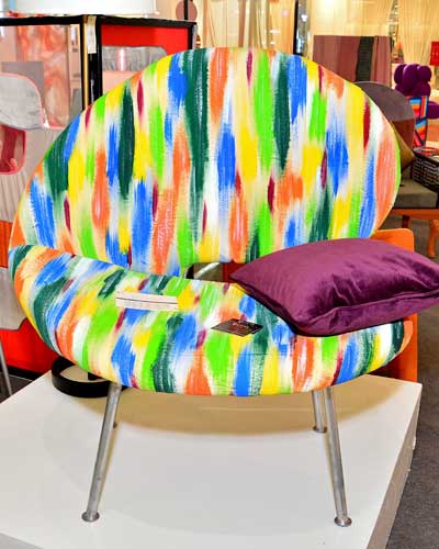 The hand-painted Pintados chair by Michelle Raven Landicho is inspired by the remnants of paint on a palette.