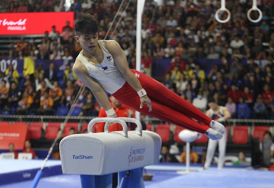 Carlos Yulo clinches the gold medal in the all-around men's artistic gymnastics event. PHOTO BY ENRIQUE AGCAOILI