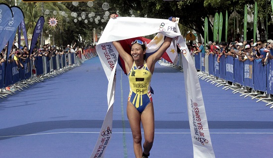 Kim Mangrobang dashes to victory, snaring the Philippines' third gold in the 30th Southeast Asian Games on Sunday, Dec. 1, 2019.  PHOTO BY ROGER RAÑADA