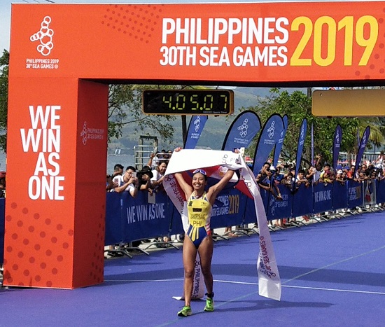 Kim Mangrobang dashes to victory, snaring the Philippines' third gold in the 30th Southeast Asian Games on Sunday, Dec. 1, 2019.  PHOTO BY JEAN RUSSEL DAVID