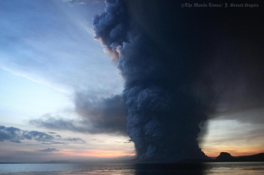 The eruption of Taal Volcano is seen from Balete town in Batangas on Sunday afternoon. PHOTO BY J. GERARD SEGUIA