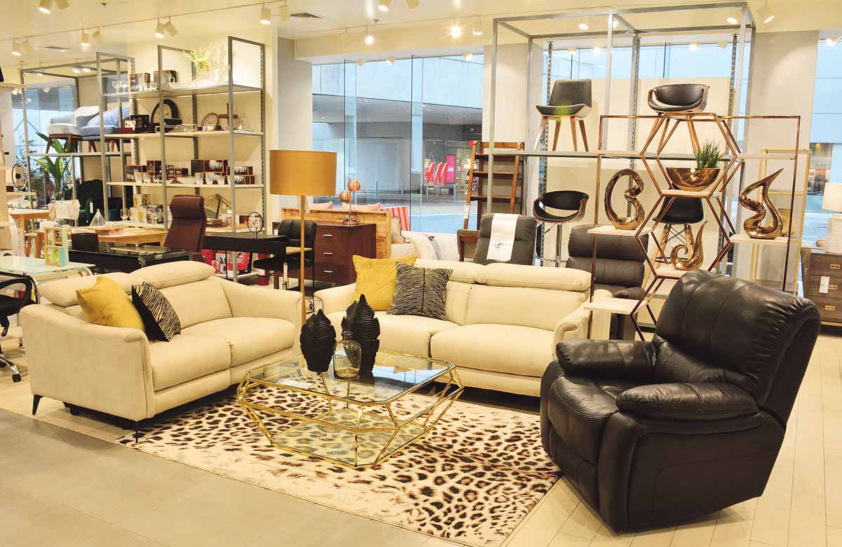 A simple, subtle and sophisticated Modern
Contemporary living room is easy to achieve
with these Alana two- and three-seater
recliner sofas, Harper one seater recliner, Arvin
center table and Giselle shelving.