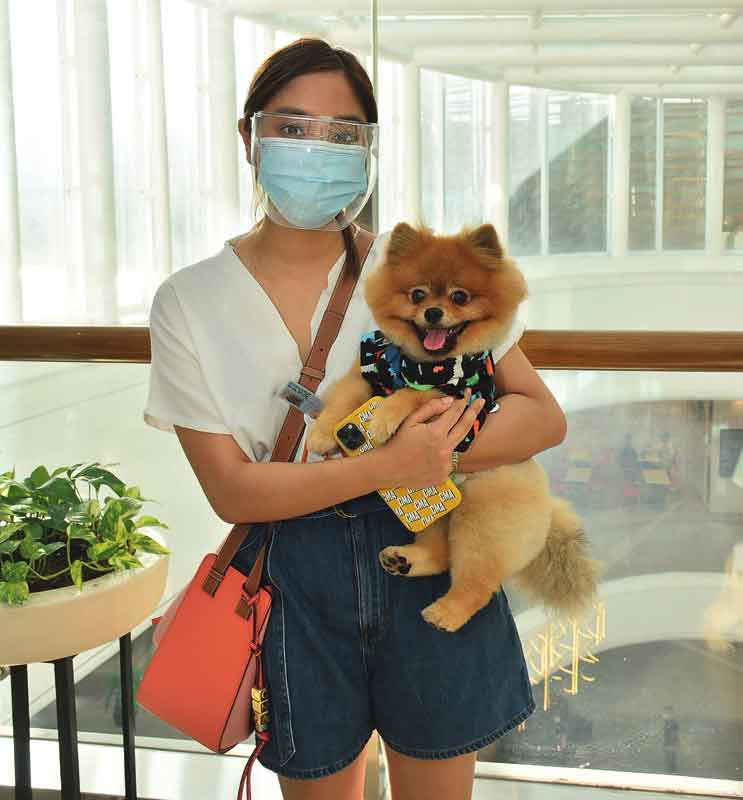 Charlene Abalos with Pomeranian Lili